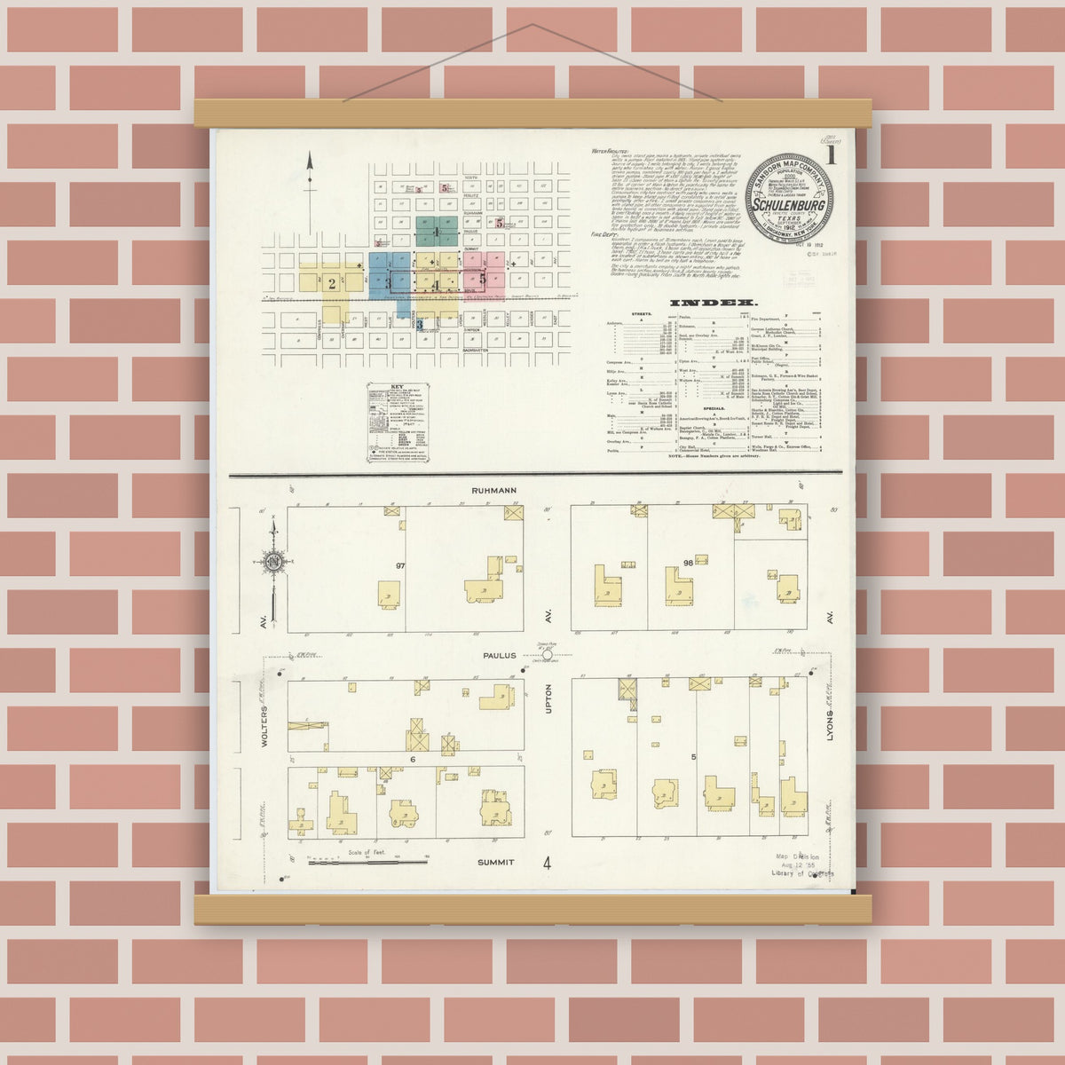 Old map wall art mockup — magnetic wood frame on brick wall — Sanborn Fire Insurance Map from Schulenburg, Fayette County, Texas (1912), Sheet #0001