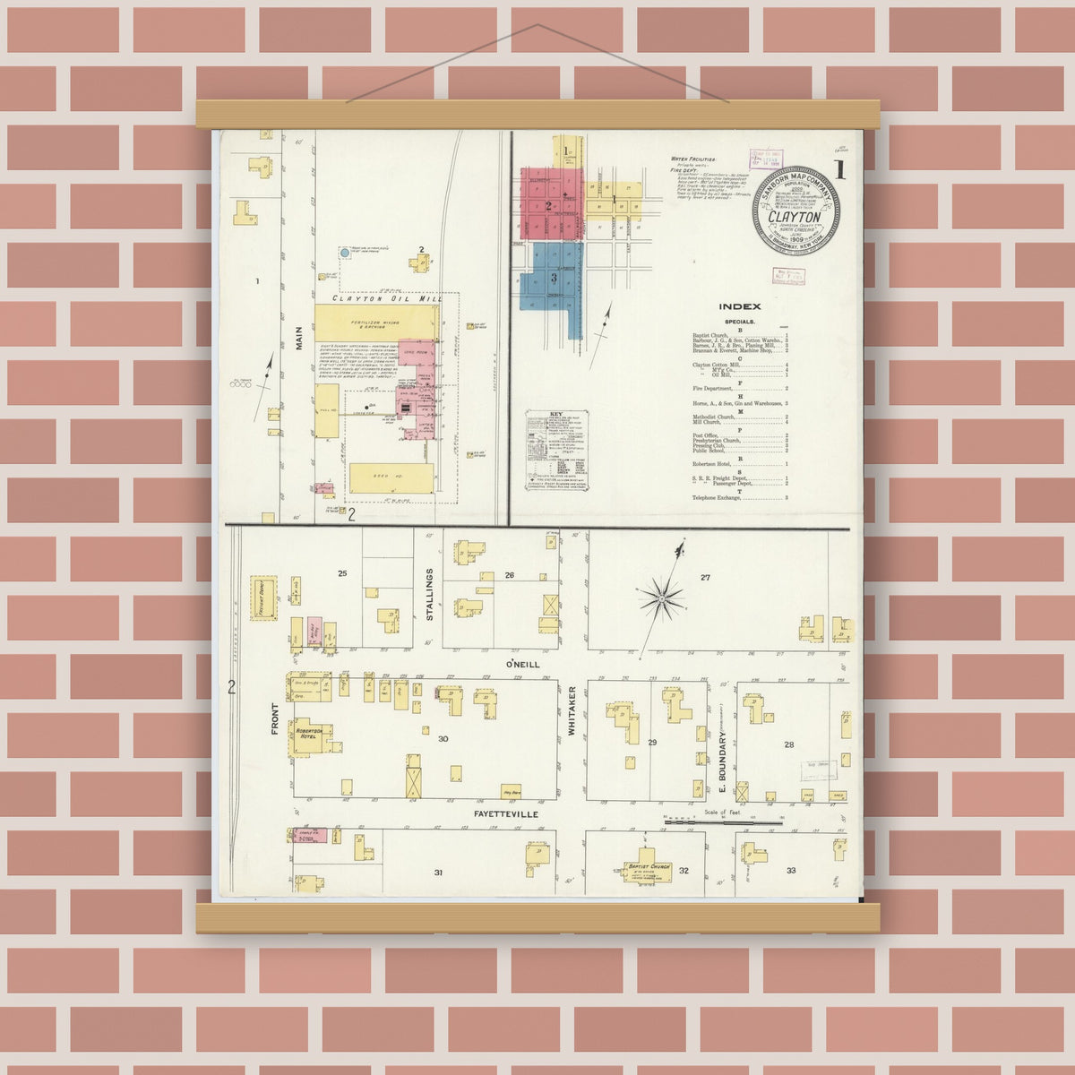 Old map wall art mockup — magnetic wood frame on brick wall — Sanborn Fire Insurance Map from Clayton, Johnston County, North Carolina (1909), Sheet #0001