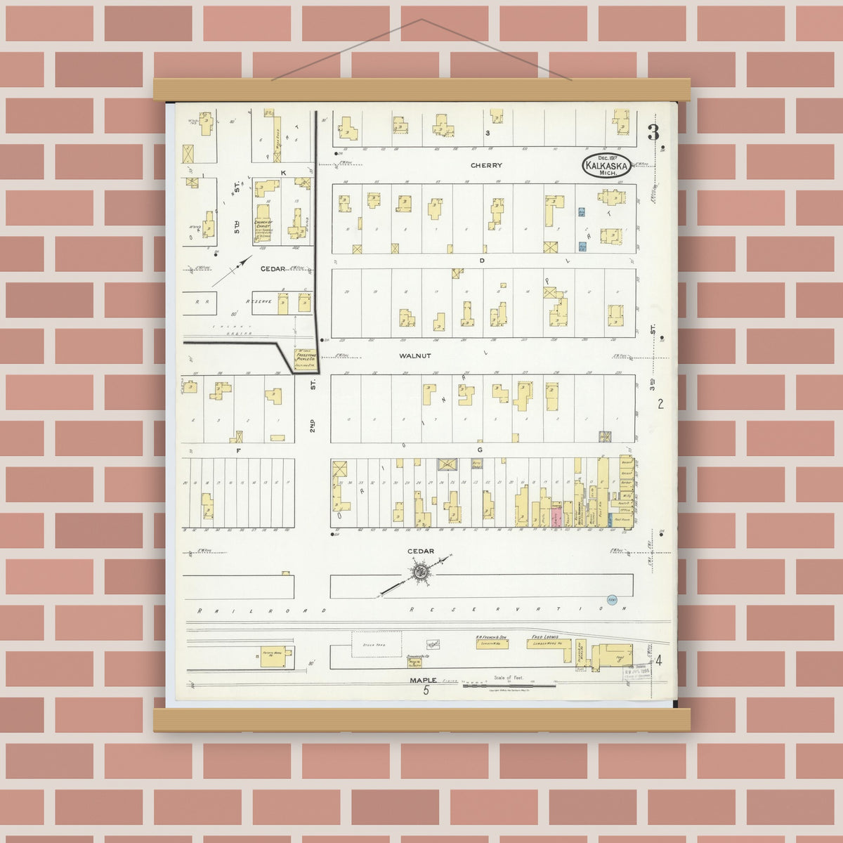 Old map wall art mockup — magnetic wood frame on brick wall — Sanborn Fire Insurance Map from Kalkaska, Kalkaska County, Michigan (1917), Sheet #0003