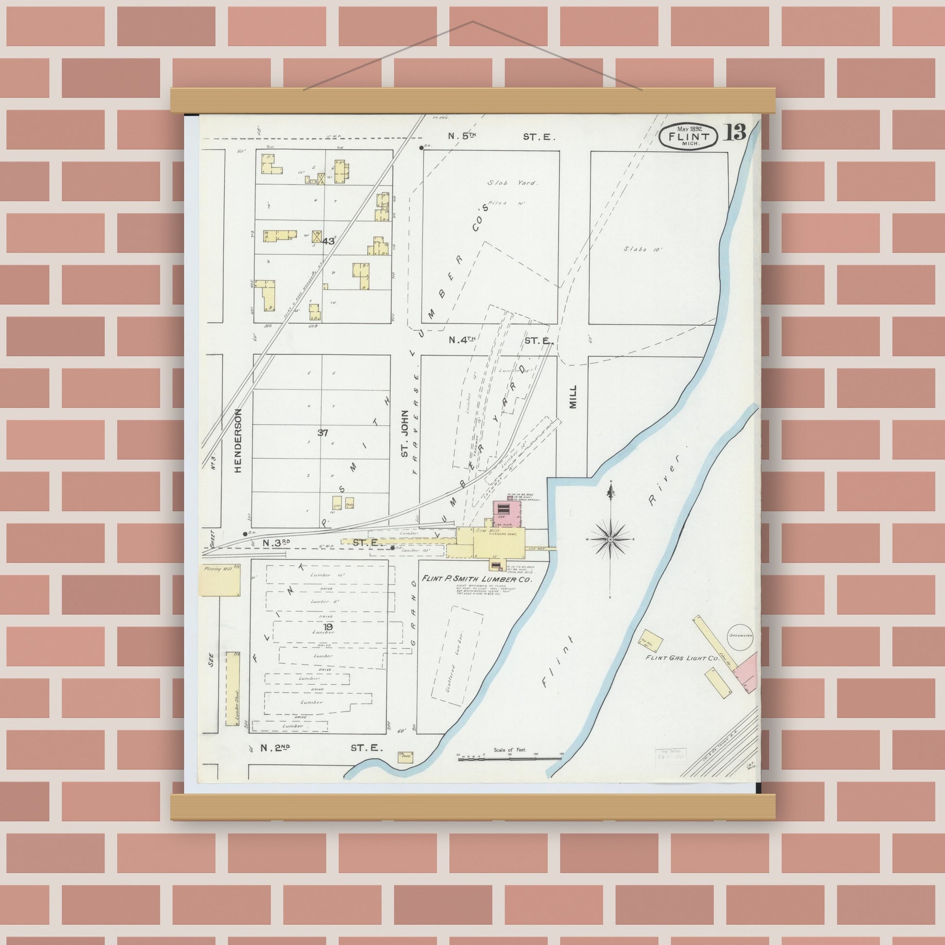 Old map wall art mockup — magnetic wood frame on brick wall — Sanborn Fire Insurance Map from Flint, Genesee County, Michigan (1892), Sheet #0013