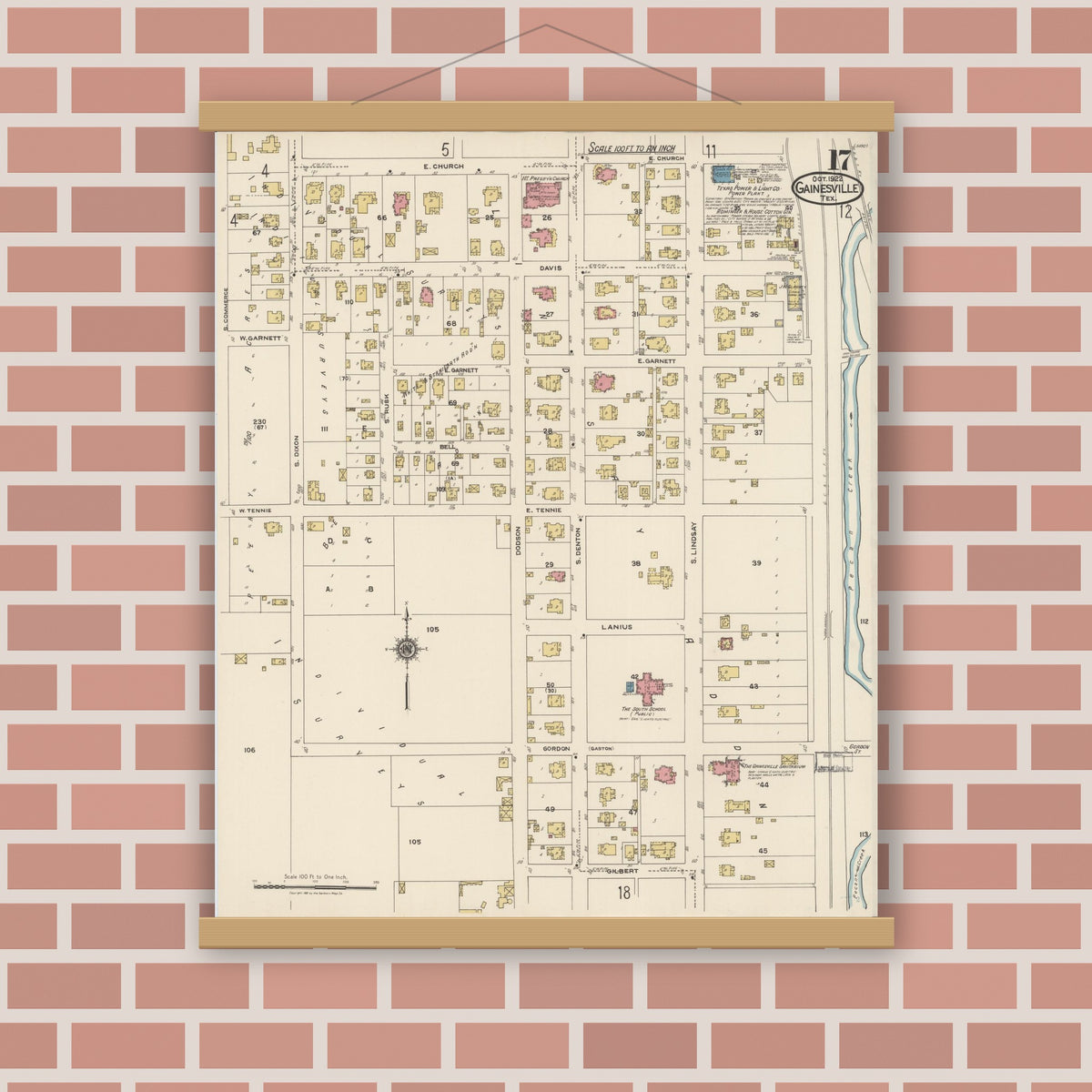Old map wall art mockup — magnetic wood frame on brick wall — Sanborn Fire Insurance Map from Gainesville, Cooke County, Texas (1922), Sheet #0017