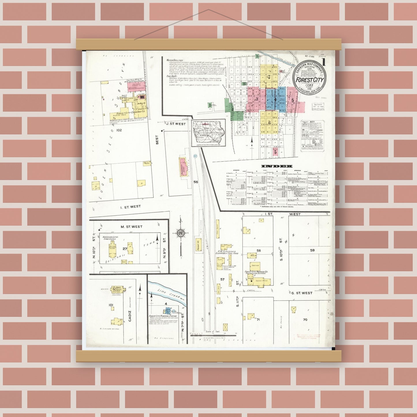 Old map wall art mockup — magnetic wood frame on brick wall — Sanborn Fire Insurance Map from Forest City, Winnebago County, Iowa (1916), Sheet #0001