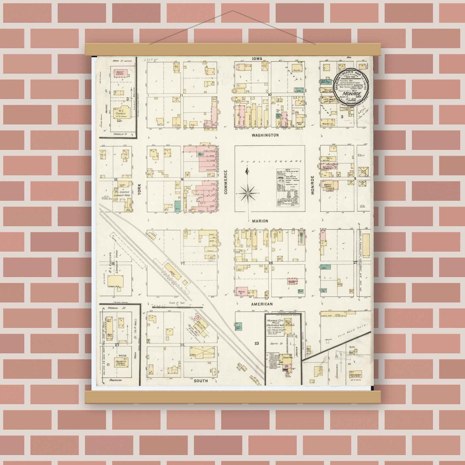 Old map wall art mockup — magnetic wood frame on brick wall — Sanborn Fire Insurance Map from Monroe, Jasper County, Iowa (1895), Sheet #0001