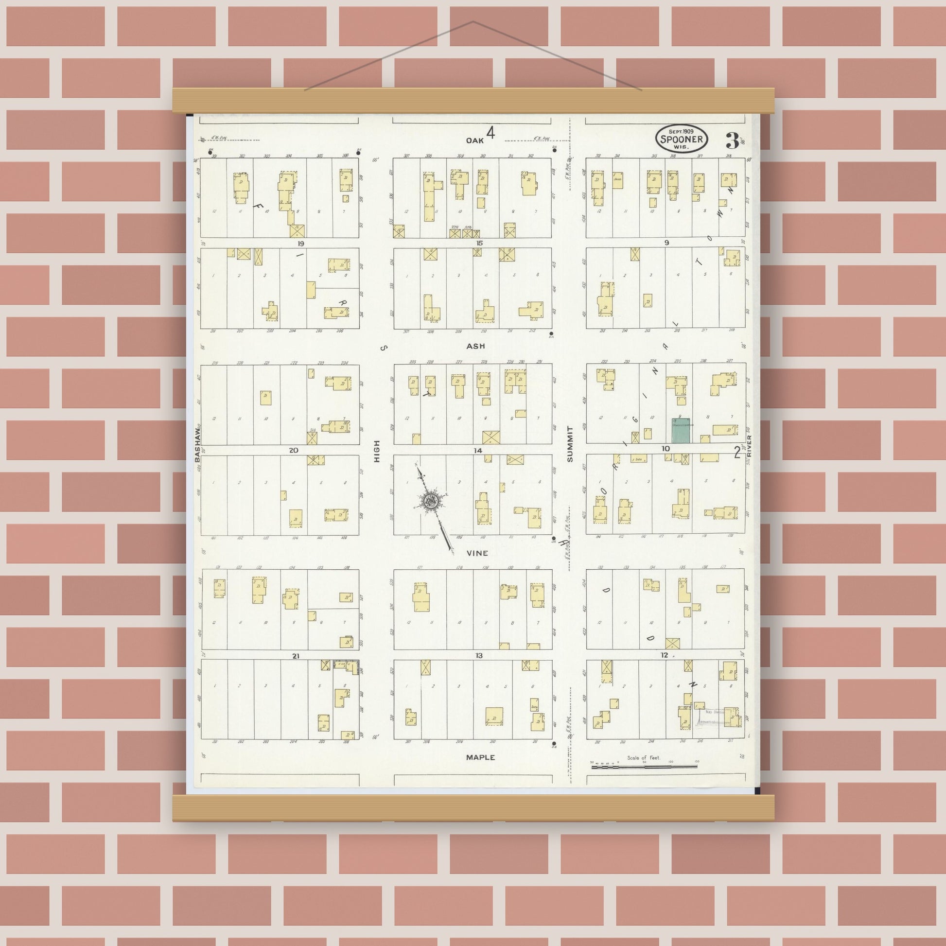 Old map wall art mockup — magnetic wood frame on brick wall — Sanborn Fire Insurance Map from Spooner, Washburn County, Wisconsin (1909), Sheet #0003
