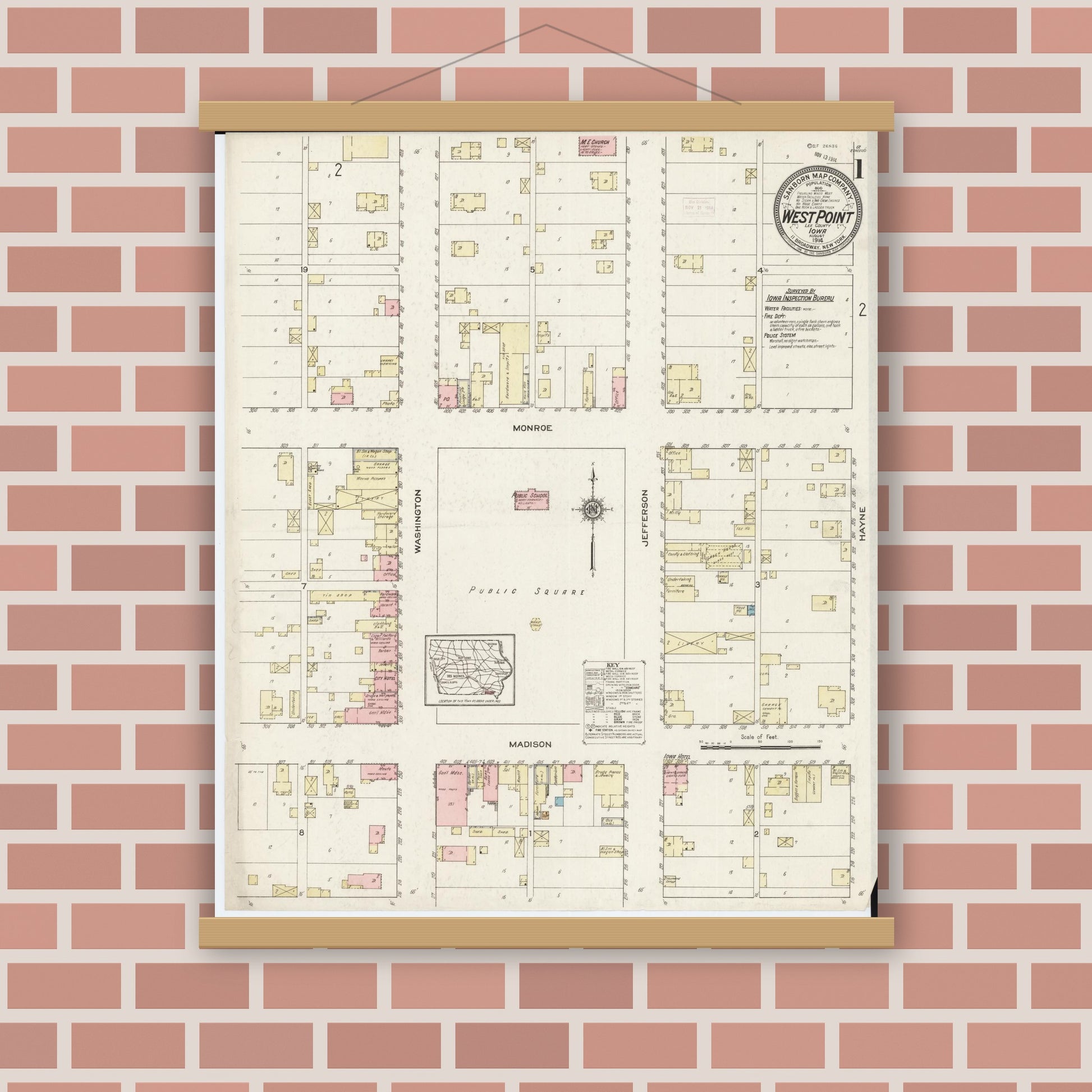 Old map wall art mockup — magnetic wood frame on brick wall — Sanborn Fire Insurance Map from West Point, Lee County, Iowa (1914), Sheet #0001
