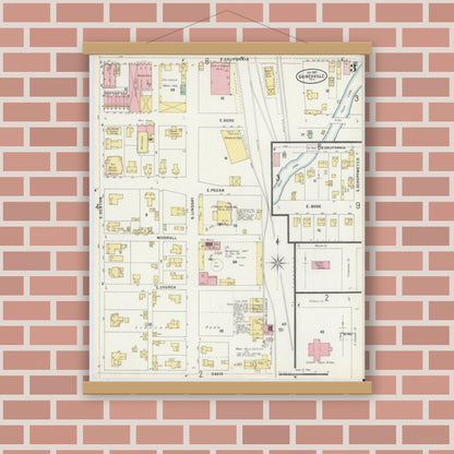 Old map wall art mockup — magnetic wood frame on brick wall — Sanborn Fire Insurance Map from Gainesville, Cooke County, Texas (1897), Sheet #0003
