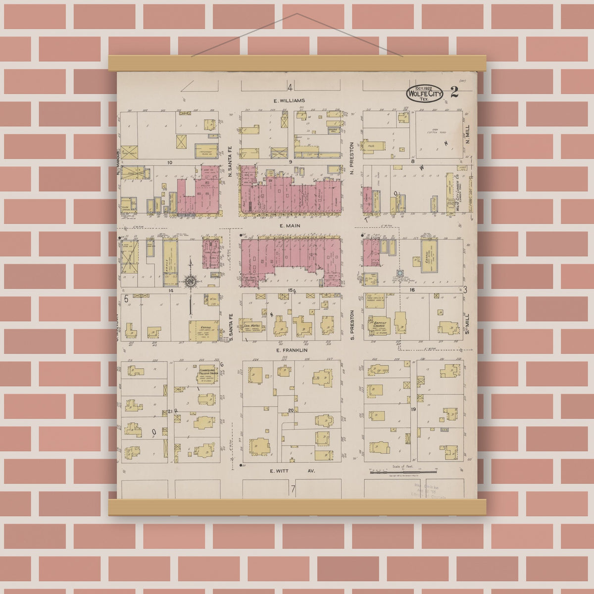 Old map wall art mockup — magnetic wood frame on brick wall — Sanborn Fire Insurance Map from Wolfe City, Hunt County, Texas (1922), Sheet #0002