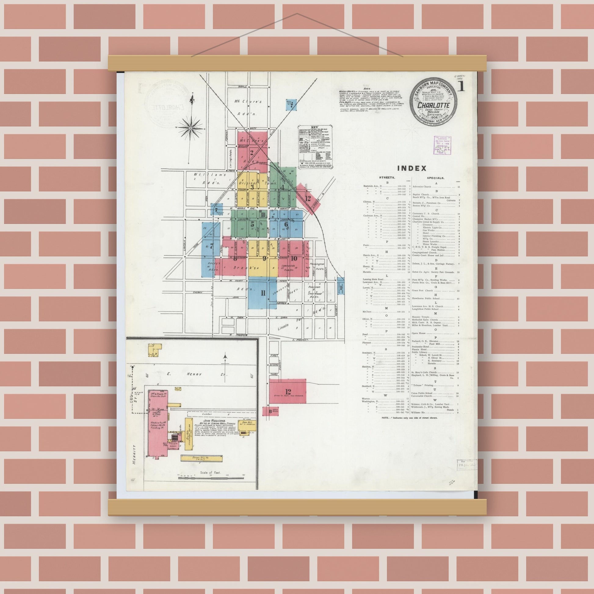 Old map wall art mockup — magnetic wood frame on brick wall — Sanborn Fire Insurance Map from Charlotte, Eaton County, Michigan (1904), Sheet #0001