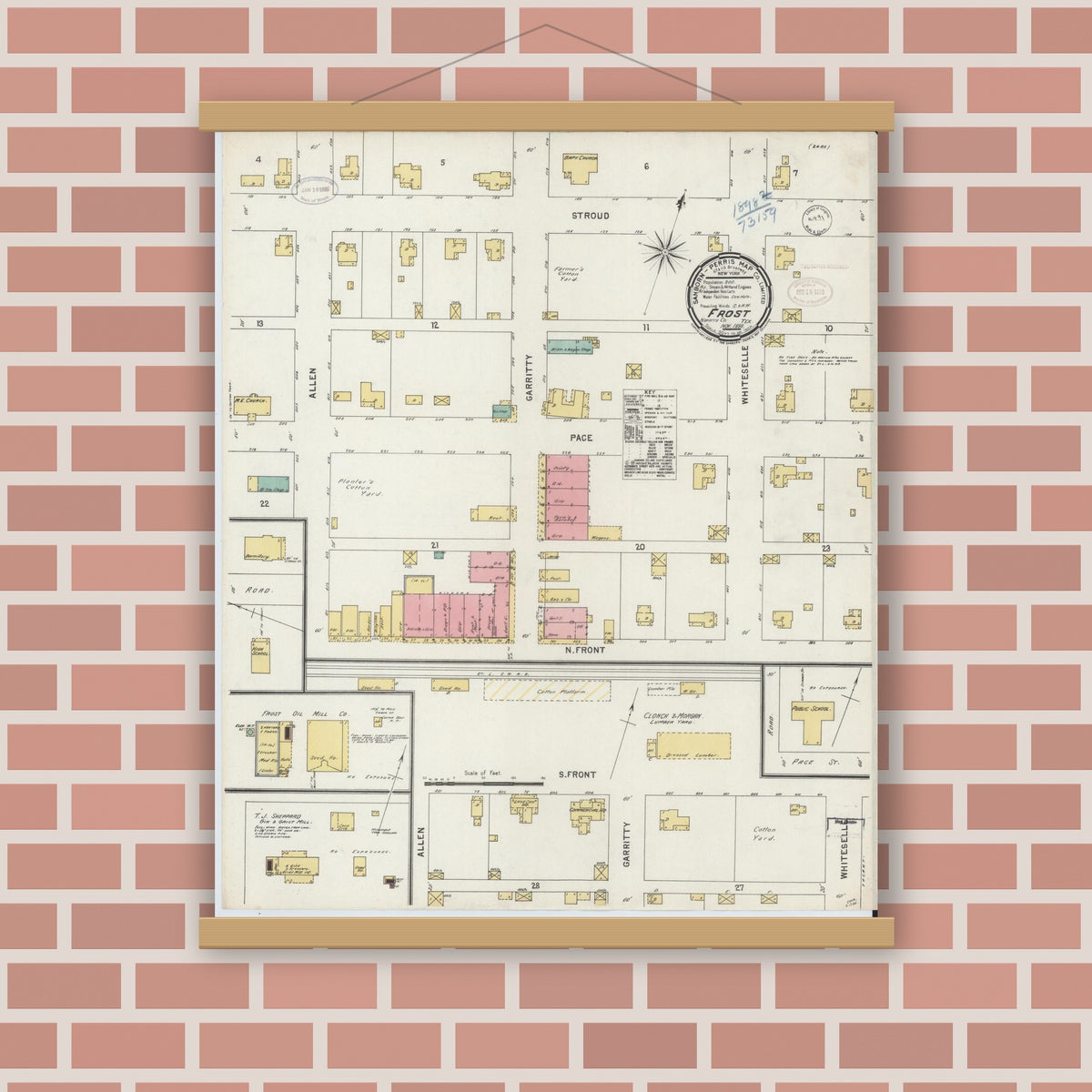 Old map wall art mockup — magnetic wood frame on brick wall — Sanborn Fire Insurance Map from Frost, Navarro County, Texas (1898), Sheet #0001