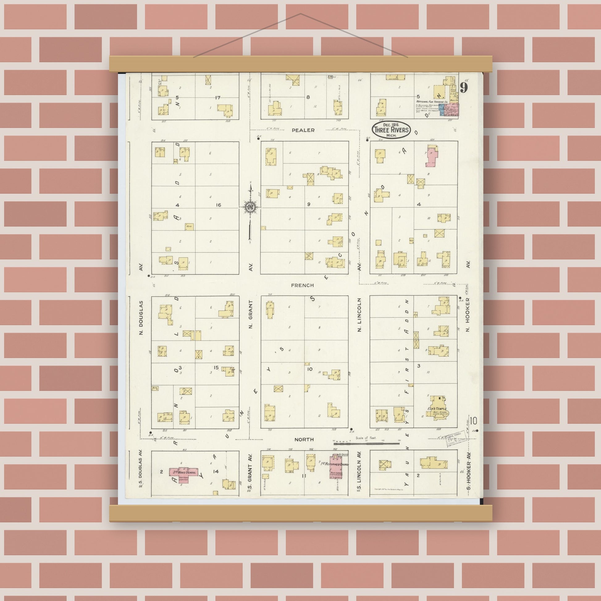 Old map wall art mockup — magnetic wood frame on brick wall — Sanborn Fire Insurance Map from Three Rivers, Saint Joseph County, Michigan (1916), Sheet #0009