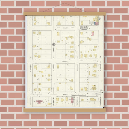 Old map wall art mockup — magnetic wood frame on brick wall — Sanborn Fire Insurance Map from Three Rivers, Saint Joseph County, Michigan (1916), Sheet #0009