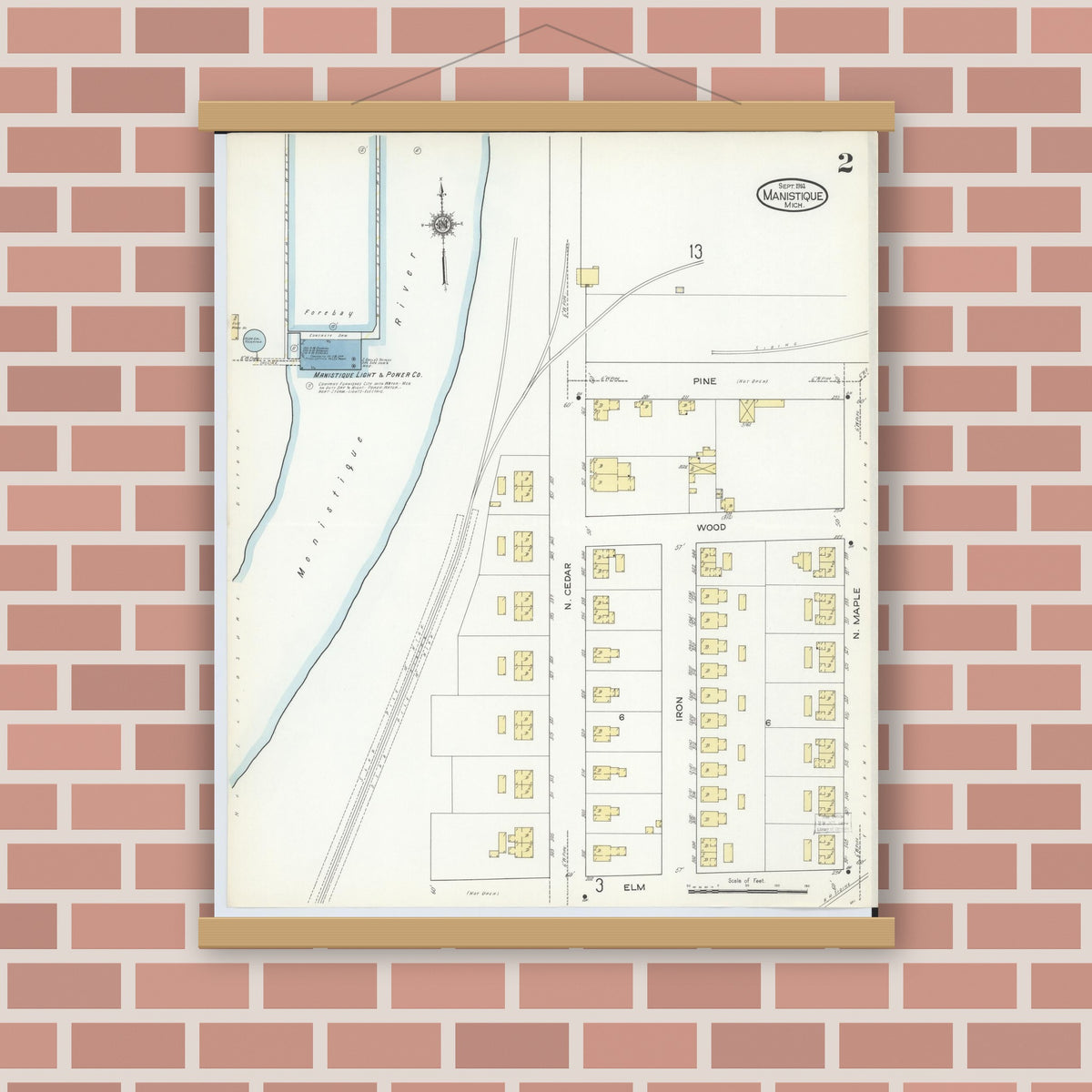 Old map wall art mockup — magnetic wood frame on brick wall — Sanborn Fire Insurance Map from Manistique, Schoolcraft County, Michigan (1914), Sheet #0002