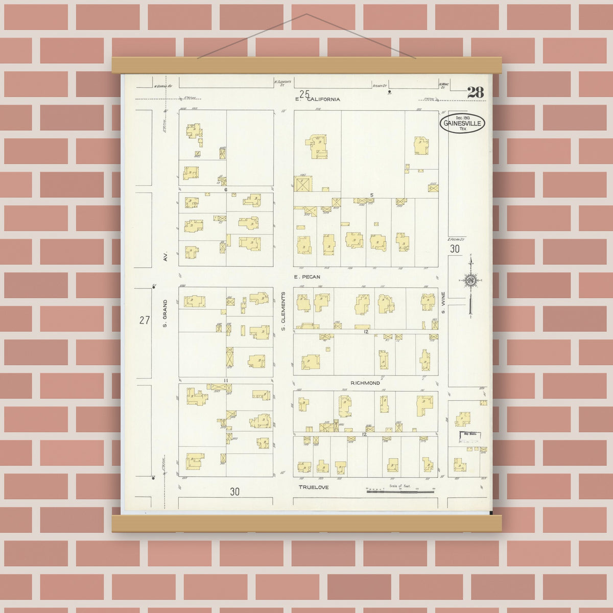 Old map wall art mockup — magnetic wood frame on brick wall — Sanborn Fire Insurance Map from Gainesville, Cooke County, Texas (1913), Sheet #0028