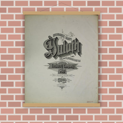 Old map wall art mockup — magnetic wood frame on brick wall — Sanborn Fire Insurance Map from Duluth, Saint Louis County, Minnesota (1909), Sheet #0001
