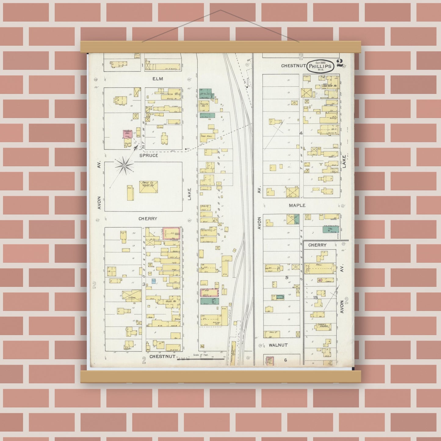 Old map wall art mockup — magnetic wood frame on brick wall — Sanborn Fire Insurance Map from Phillips, Price County, Wisconsin (1892), Sheet #0002