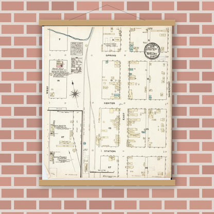 Old map wall art mockup — magnetic wood frame on brick wall — Sanborn Fire Insurance Map from Shelby, Shelby County, Iowa (1883), Sheet #0001