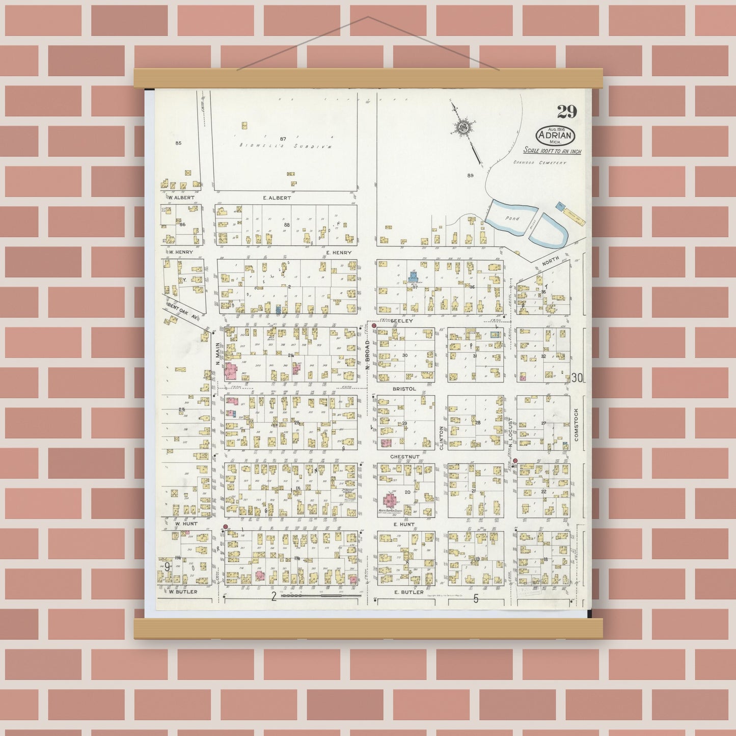 Old map wall art mockup — magnetic wood frame on brick wall — Sanborn Fire Insurance Map from Adrian, Lenawee County, Michigan (1916), Sheet #0029
