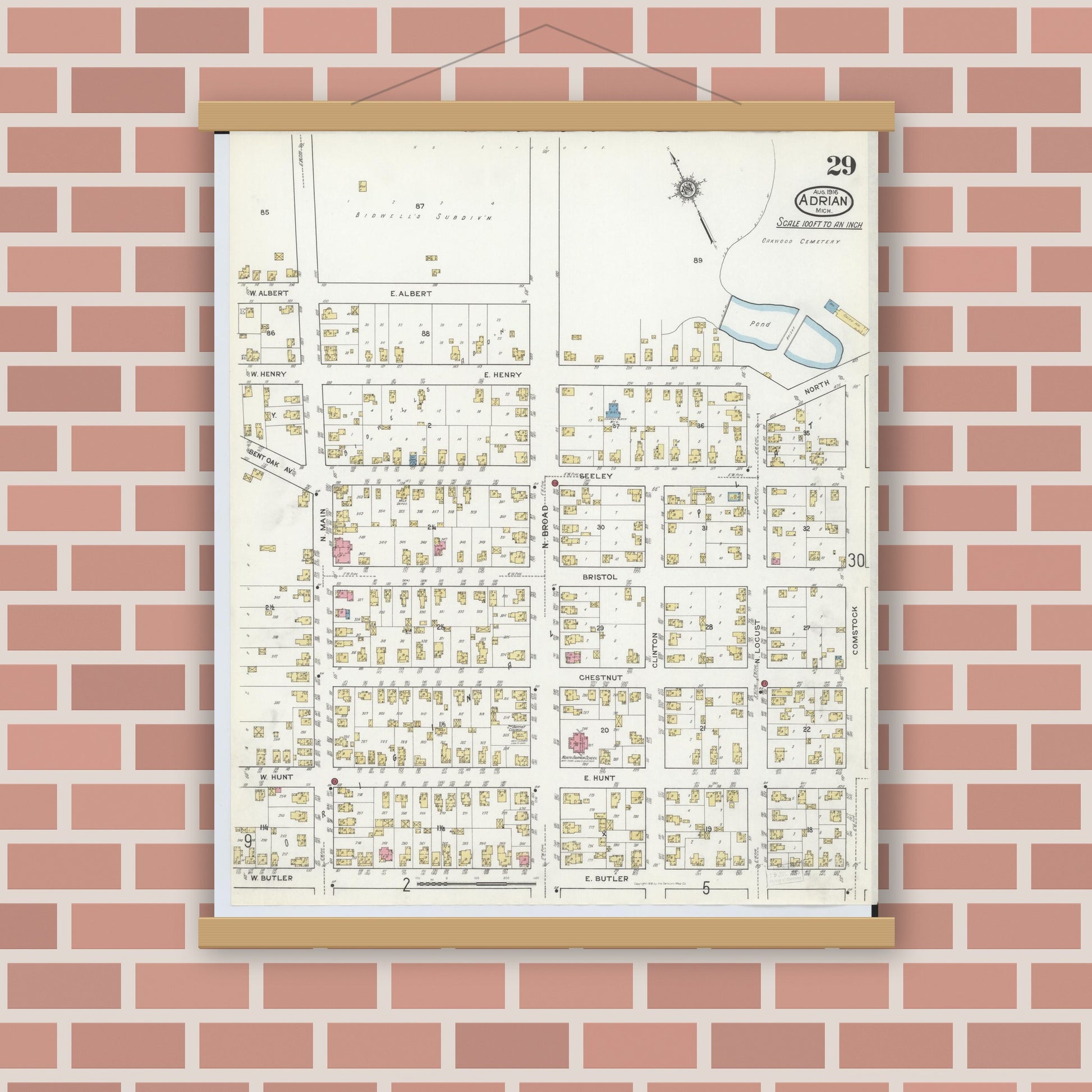 Old map wall art mockup — magnetic wood frame on brick wall — Sanborn Fire Insurance Map from Adrian, Lenawee County, Michigan (1916), Sheet #0029