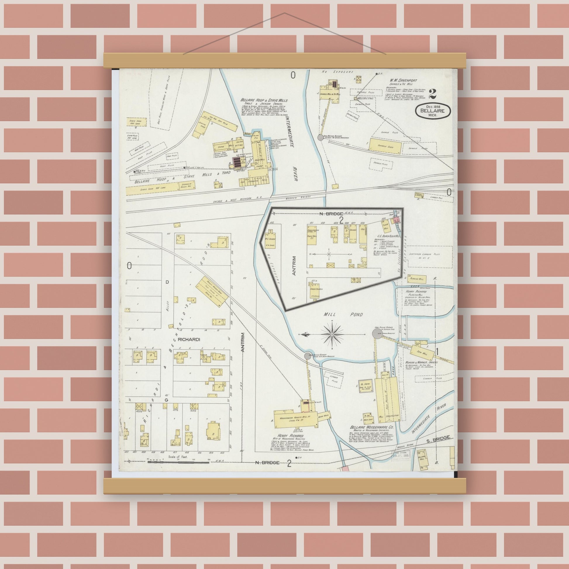 Old map wall art mockup — magnetic wood frame on brick wall — Sanborn Fire Insurance Map from Bellaire, Antrim County, Michigan (1898), Sheet #0002