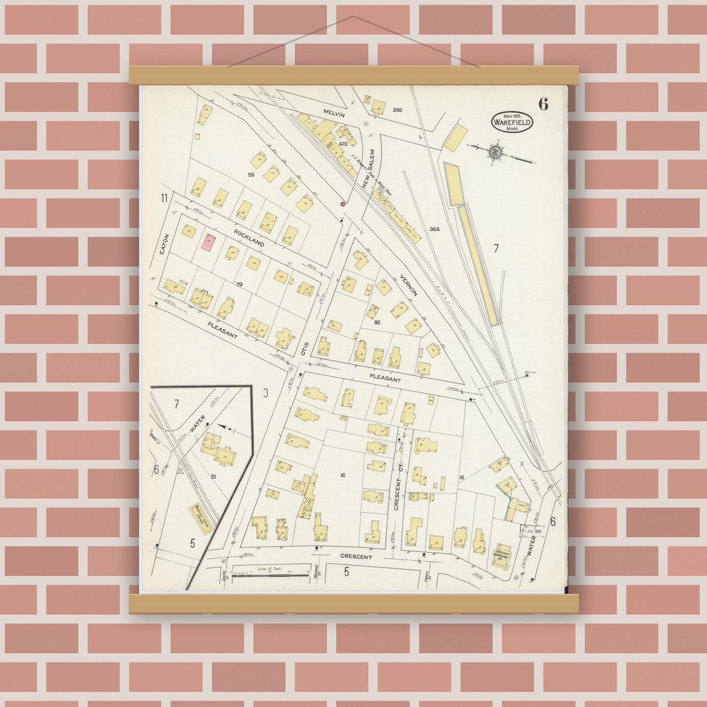 Old map wall art mockup — magnetic wood frame on brick wall — Sanborn Fire Insurance Map from Wakefield, Middlesex County, Massachusetts (1915), Sheet #0006