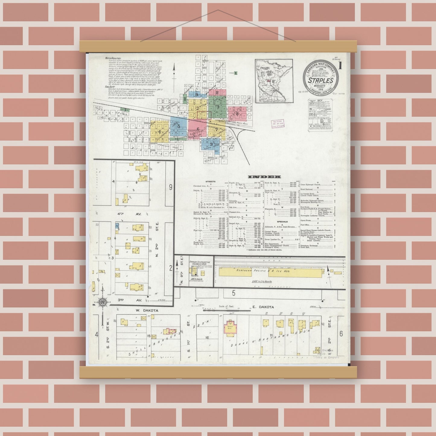 Old map wall art mockup — magnetic wood frame on brick wall — Sanborn Fire Insurance Map from Staples, Todd County, Minnesota (1916) - Complete Map Set