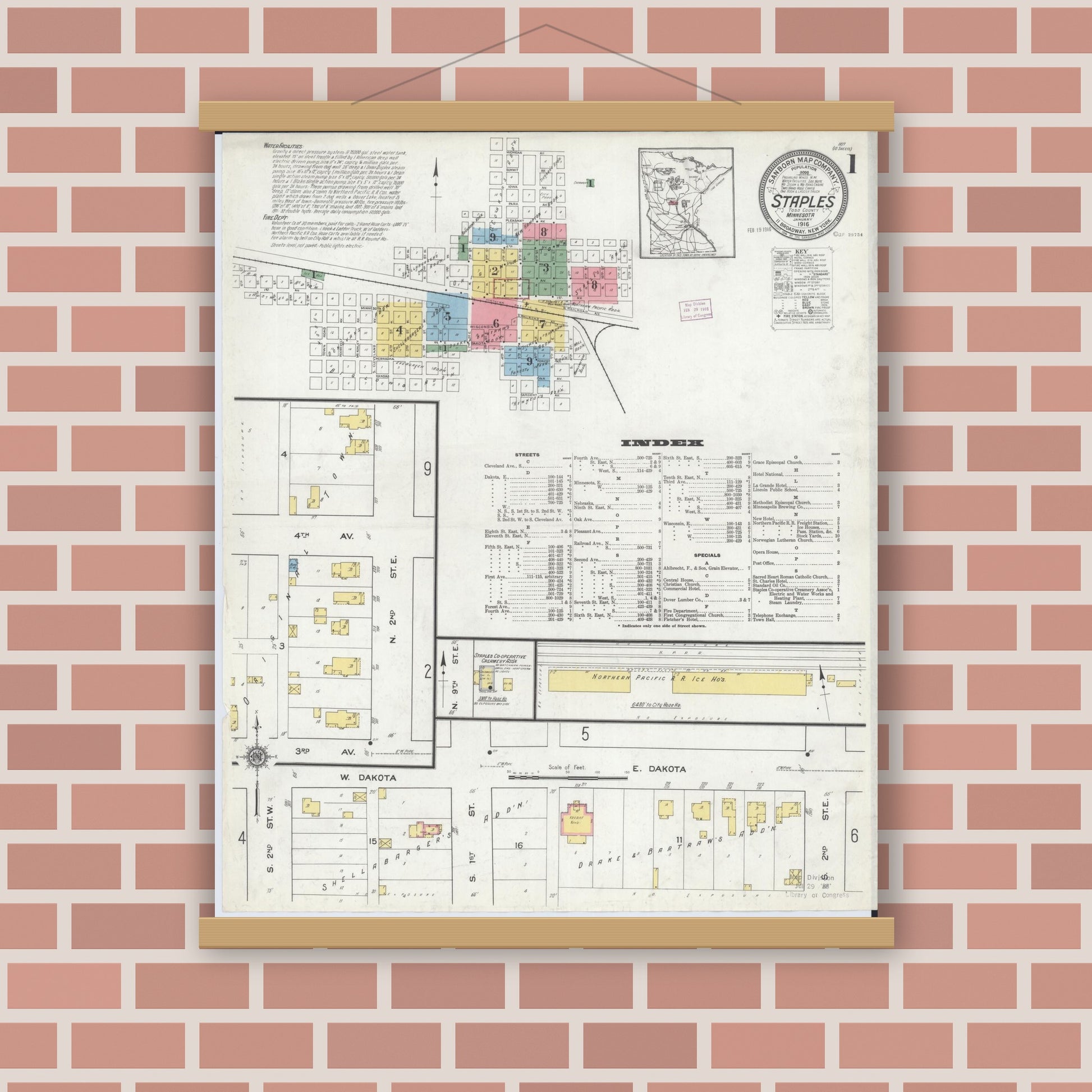 Old map wall art mockup — magnetic wood frame on brick wall — Sanborn Fire Insurance Map from Staples, Todd County, Minnesota (1916) - Complete Map Set