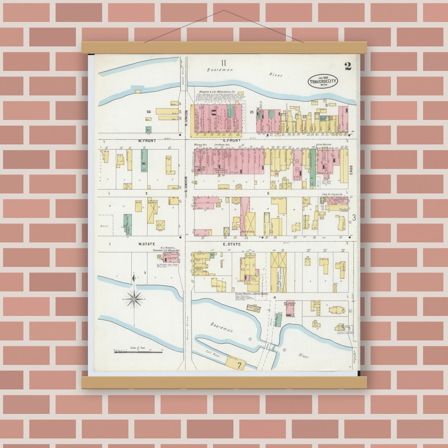 Old map wall art mockup — magnetic wood frame on brick wall — Sanborn Fire Insurance Map from Traverse City, Grand Traverse County, Michigan (1899), Sheet #0002