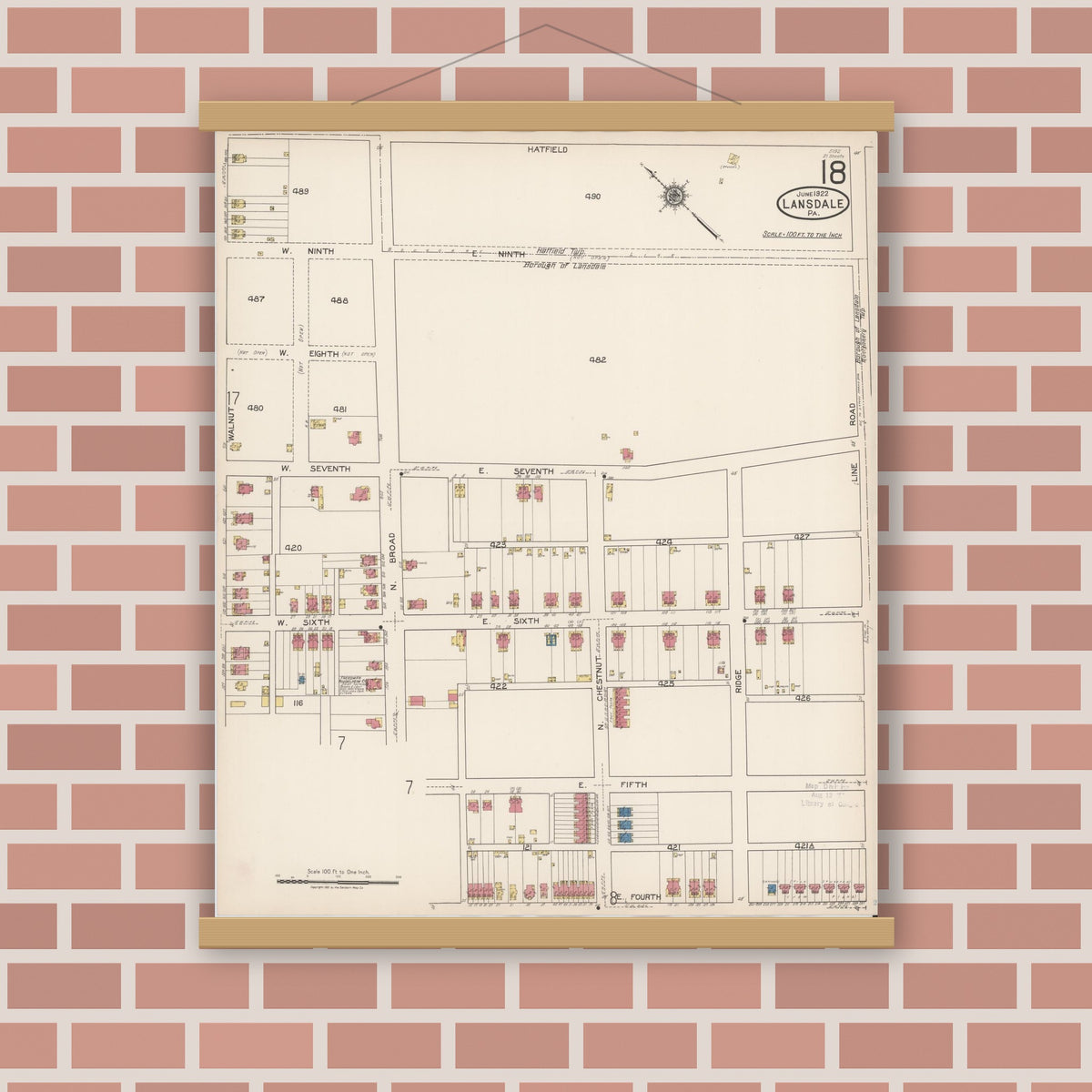Old map wall art mockup — magnetic wood frame on brick wall — Sanborn Fire Insurance Map from Lansdale, Montgomery County, Pennsylvania (1922), Sheet #0018