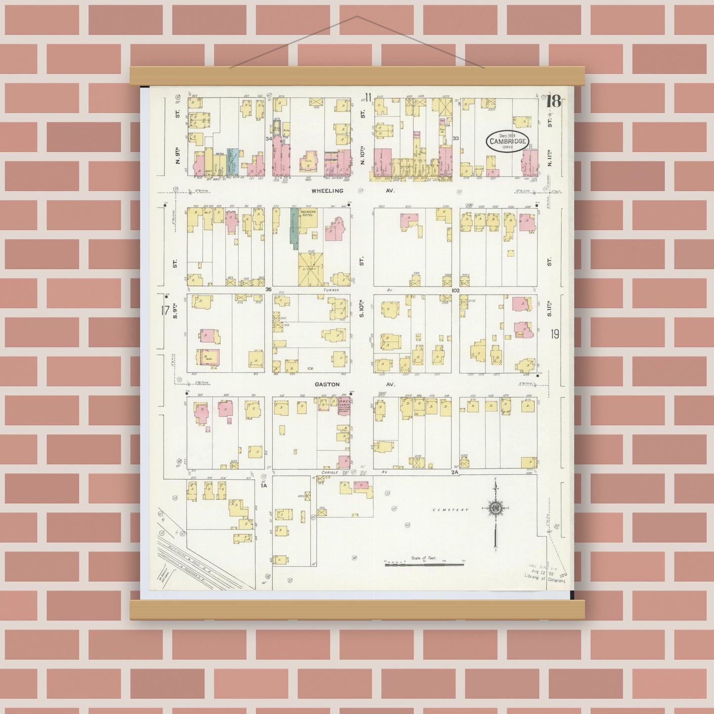 Old map wall art mockup — magnetic wood frame on brick wall — Sanborn Fire Insurance Map from Cambridge, Guernsey County, Ohio (1909), Sheet #0018