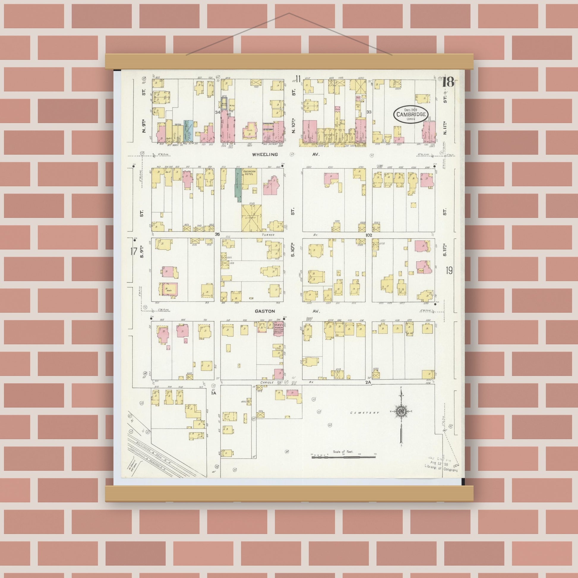 Old map wall art mockup — magnetic wood frame on brick wall — Sanborn Fire Insurance Map from Cambridge, Guernsey County, Ohio (1909), Sheet #0018