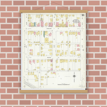 Old map wall art mockup — magnetic wood frame on brick wall — Sanborn Fire Insurance Map from Cambridge, Guernsey County, Ohio (1909), Sheet #0018