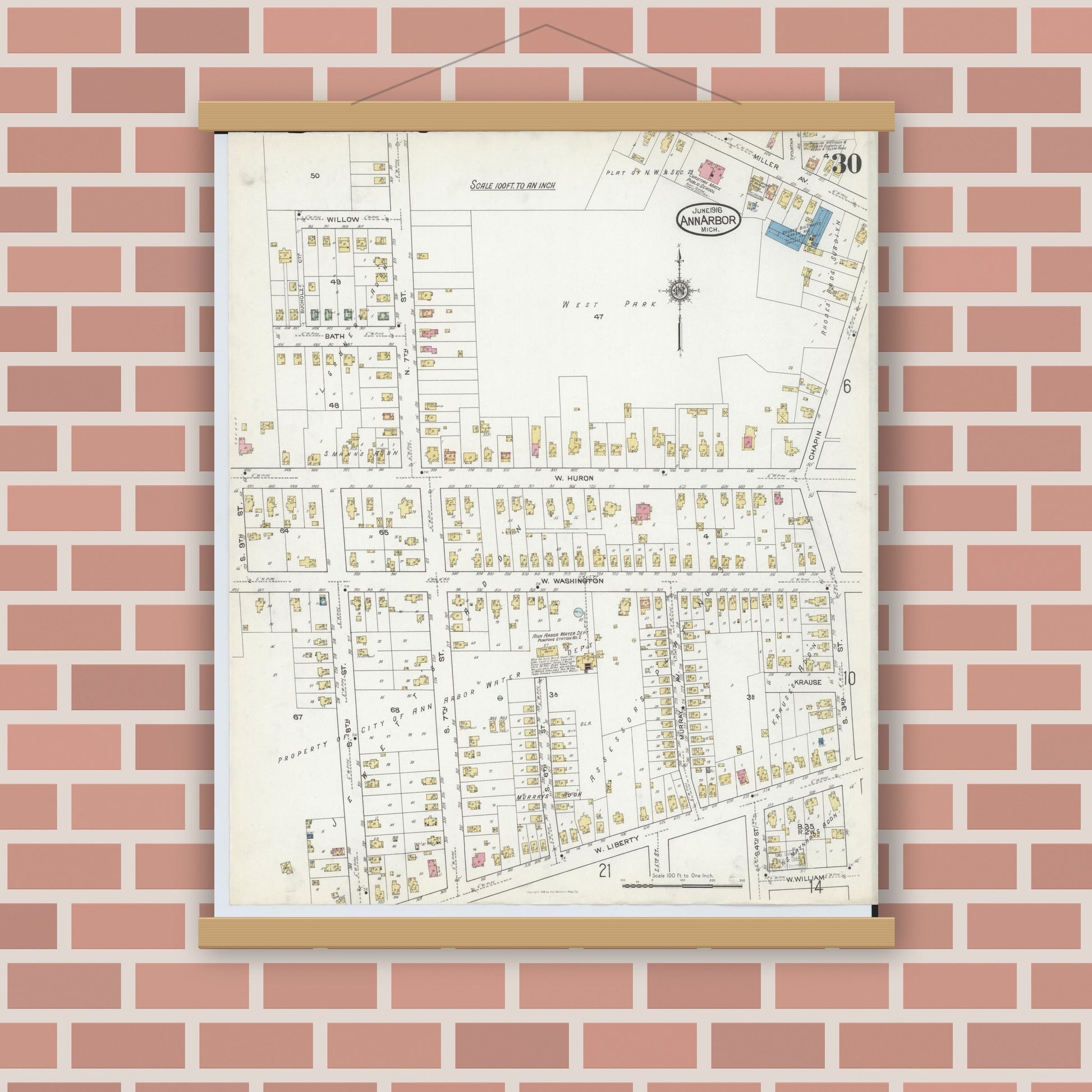 Old map wall art mockup — magnetic wood frame on brick wall — Sanborn Fire Insurance Map from Ann Arbor, Washtenaw County, Michigan (1916), Sheet #0030