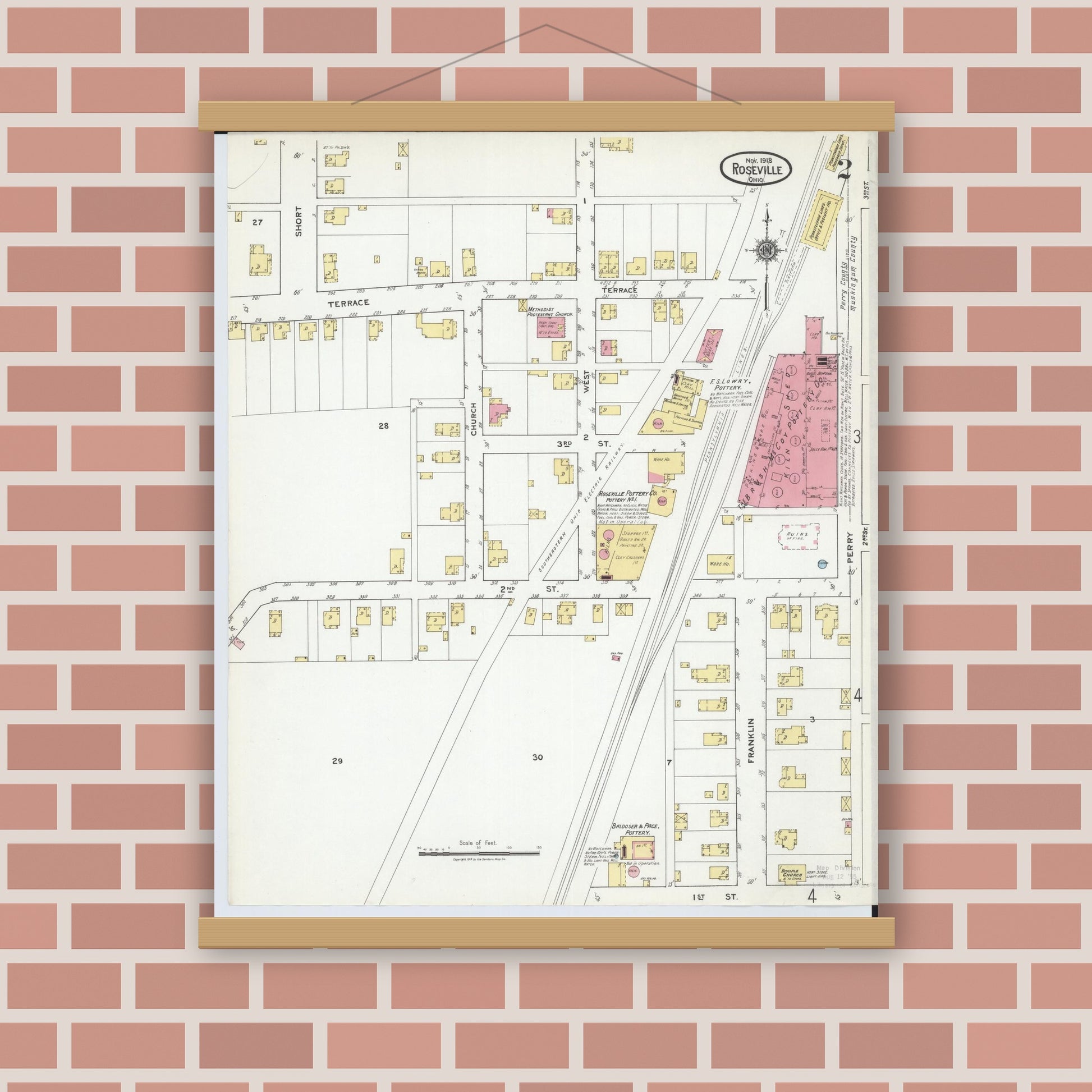 Old map wall art mockup — magnetic wood frame on brick wall — Sanborn Fire Insurance Map from Roseville, Perry And Muskingum Counties, Ohio (1918), Sheet #0002