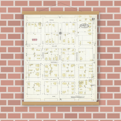 Old map wall art mockup — magnetic wood frame on brick wall — Sanborn Fire Insurance Map from Gainesville, Cooke County, Texas (1913), Sheet #0012