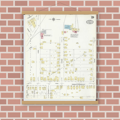 Old map wall art mockup — magnetic wood frame on brick wall — Sanborn Fire Insurance Map from Cadillac, Wexford County, Michigan (1914), Sheet #0019