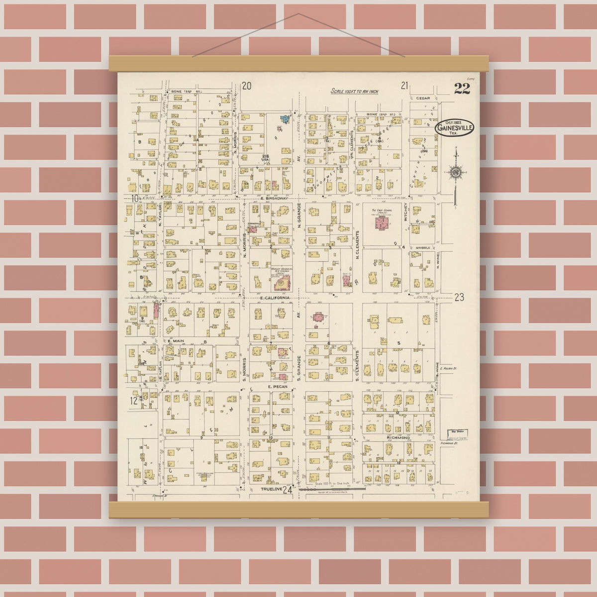 Old map wall art mockup — magnetic wood frame on brick wall — Sanborn Fire Insurance Map from Gainesville, Cooke County, Texas (1922), Sheet #0022
