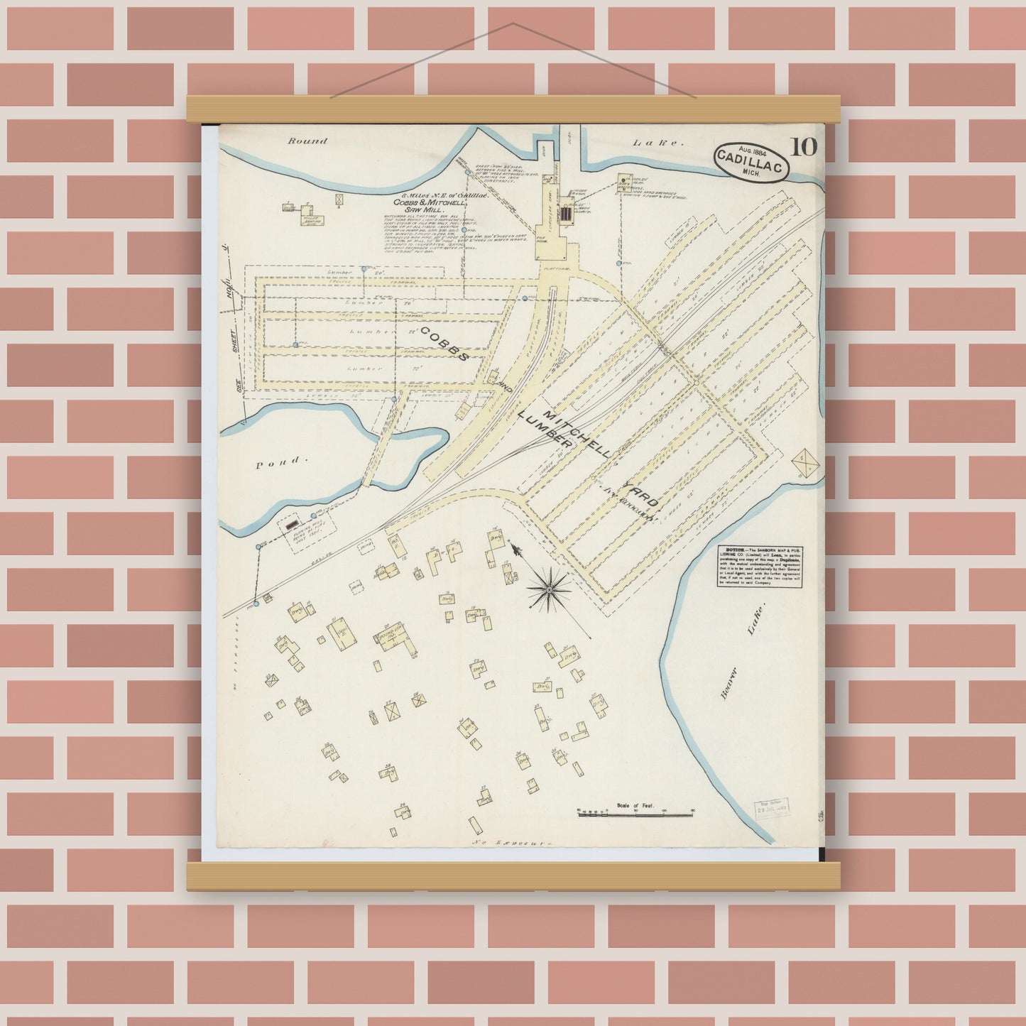 Old map wall art mockup — magnetic wood frame on brick wall — Sanborn Fire Insurance Map from Cadillac, Wexford County, Michigan (1884), Sheet #0010