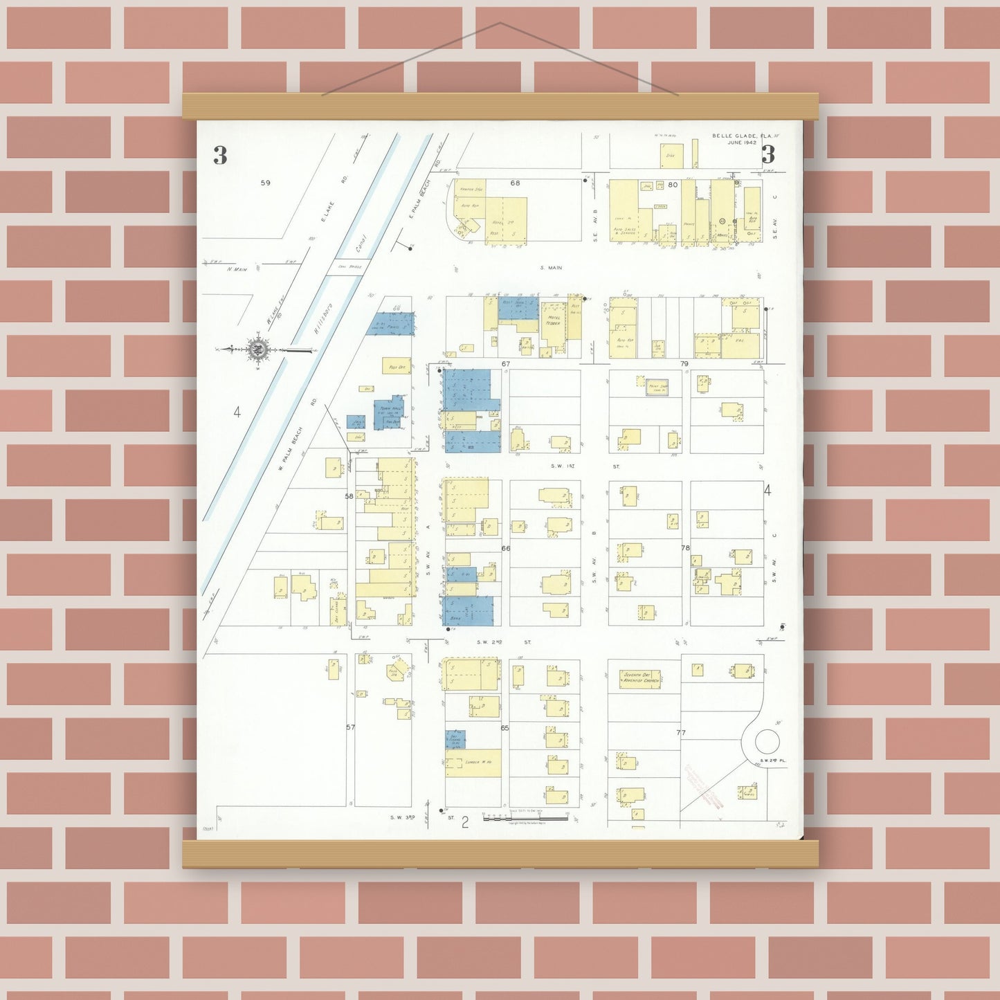 Old map wall art mockup — magnetic wood frame on brick wall — Sanborn Fire Insurance Map from Belle Glade, Palm Beach County, Florida (1942), Sheet #0003
