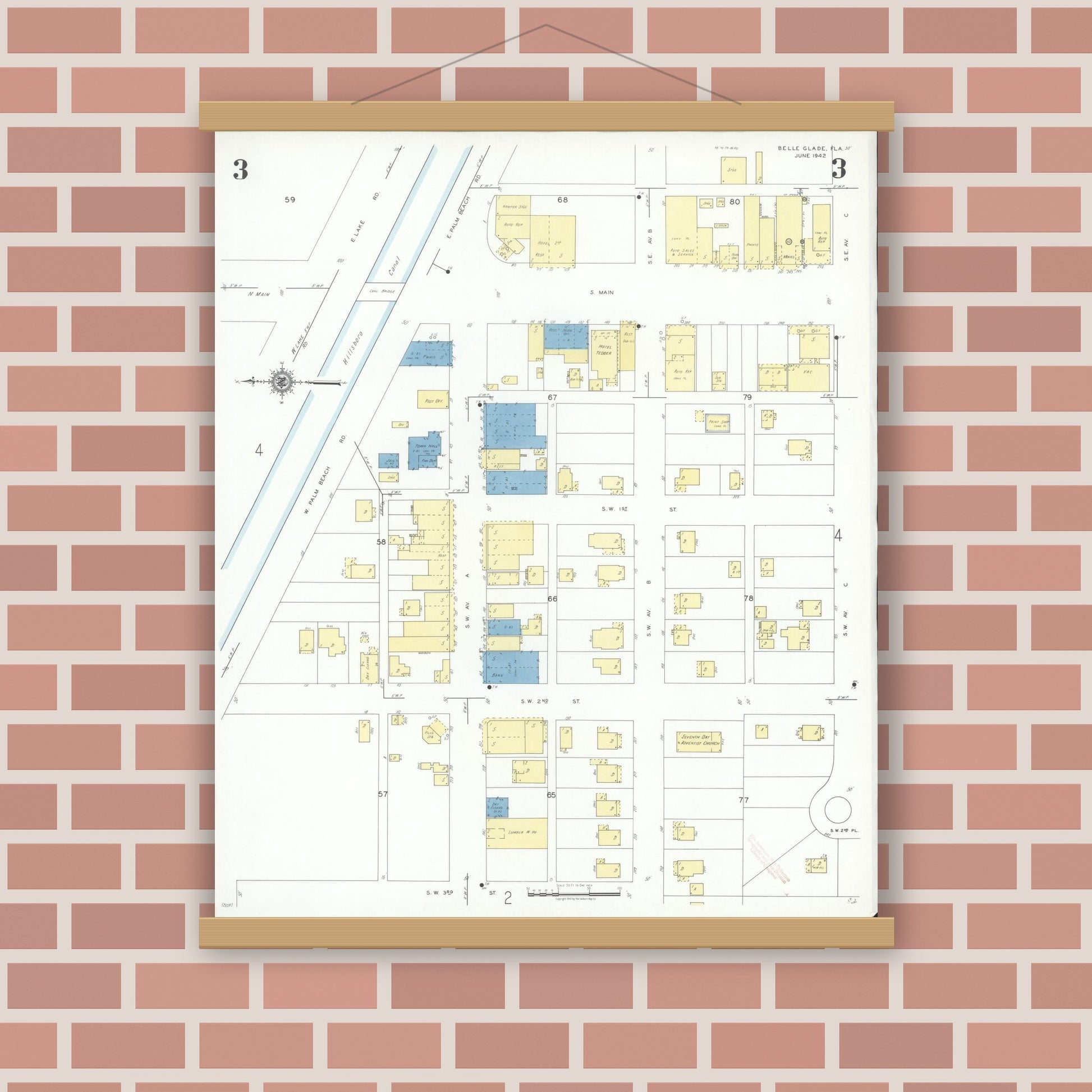 Old map wall art mockup — magnetic wood frame on brick wall — Sanborn Fire Insurance Map from Belle Glade, Palm Beach County, Florida (1942), Sheet #0003