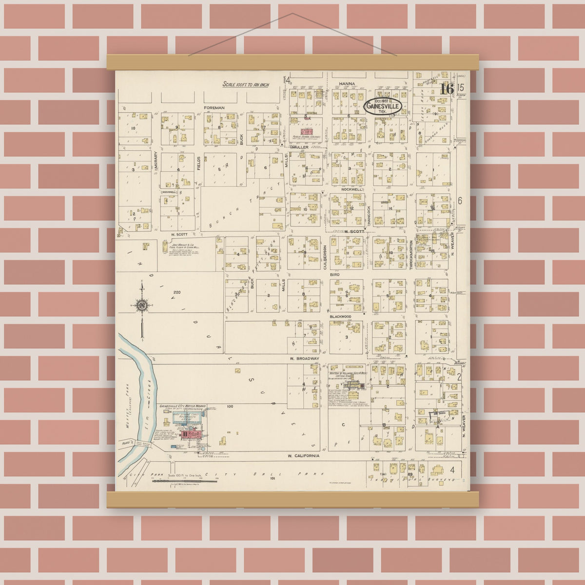 Old map wall art mockup — magnetic wood frame on brick wall — Sanborn Fire Insurance Map from Gainesville, Cooke County, Texas (1922), Sheet #0016