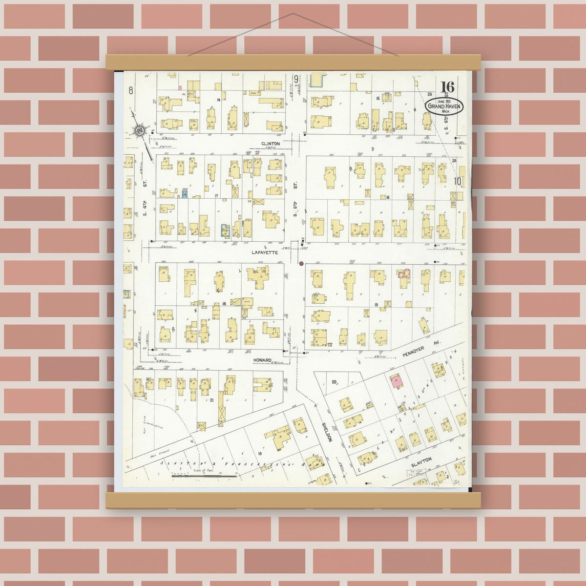 Old map wall art mockup — magnetic wood frame on brick wall — Sanborn Fire Insurance Map from Grand Haven, Ottawa County, Michigan (1912), Sheet #0016