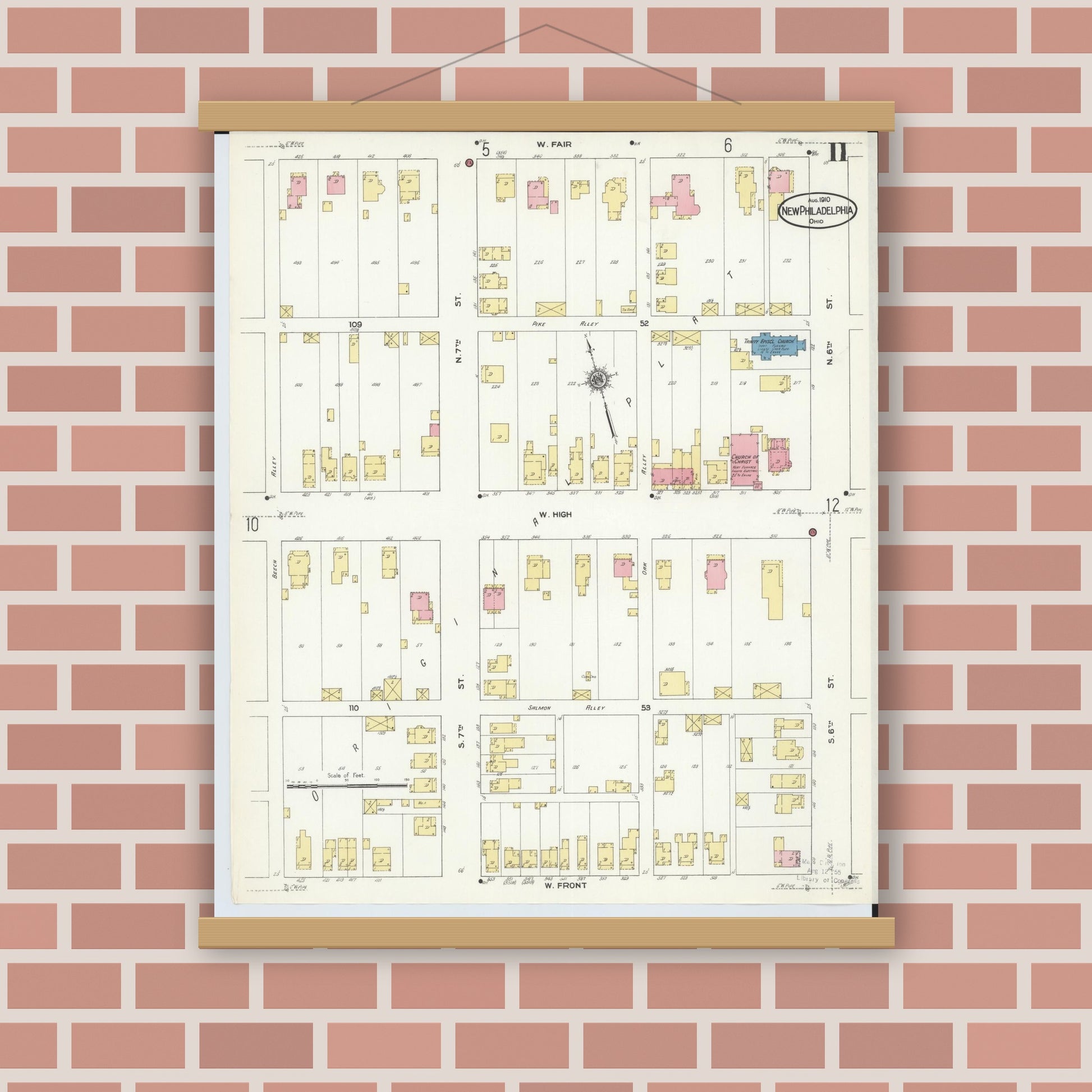 Old map wall art mockup — magnetic wood frame on brick wall — Sanborn Fire Insurance Map from New Philadelphia, Tuscarawas County, Ohio (1910), Sheet #0011