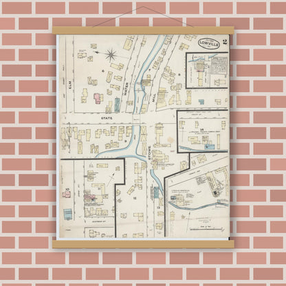 Old map wall art mockup — magnetic wood frame on brick wall — Sanborn Fire Insurance Map from Lowville, Lewis County, New York (1884), Sheet #0002