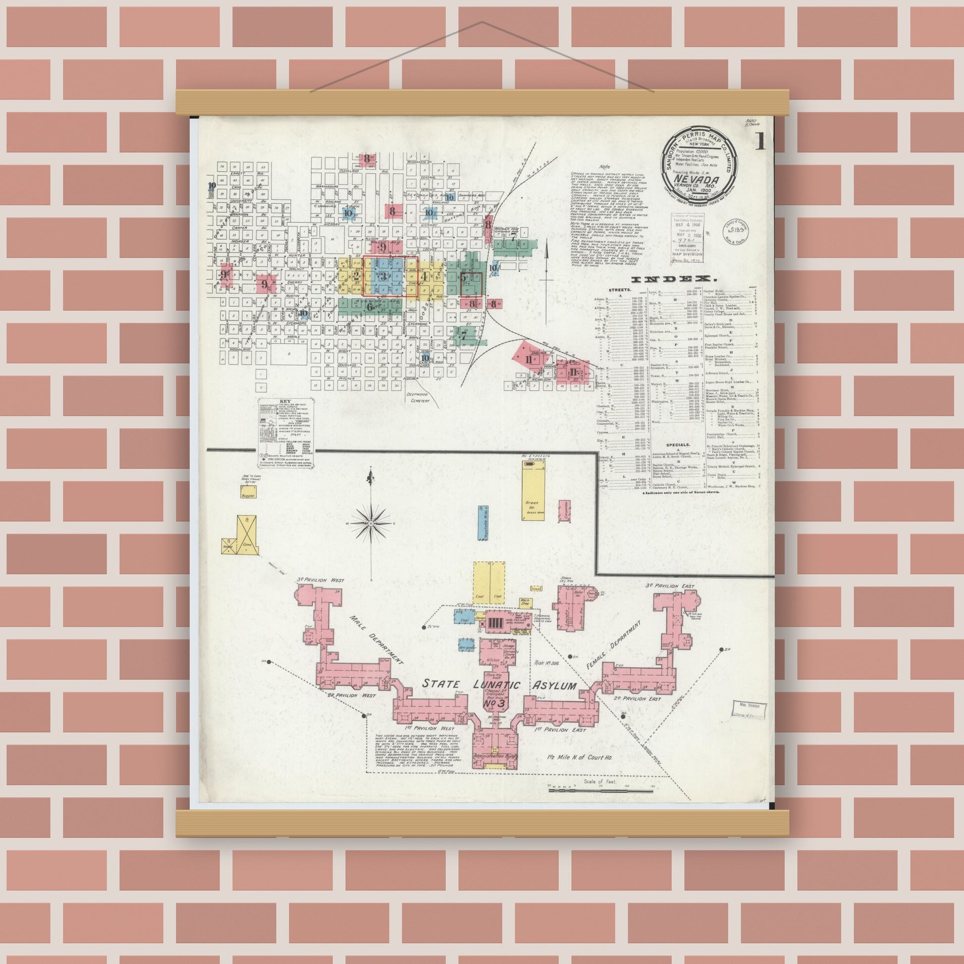 Old map wall art mockup — magnetic wood frame on brick wall — Sanborn Fire Insurance Map from Nevada, Vernon County, Missouri (1900), Sheet #0001
