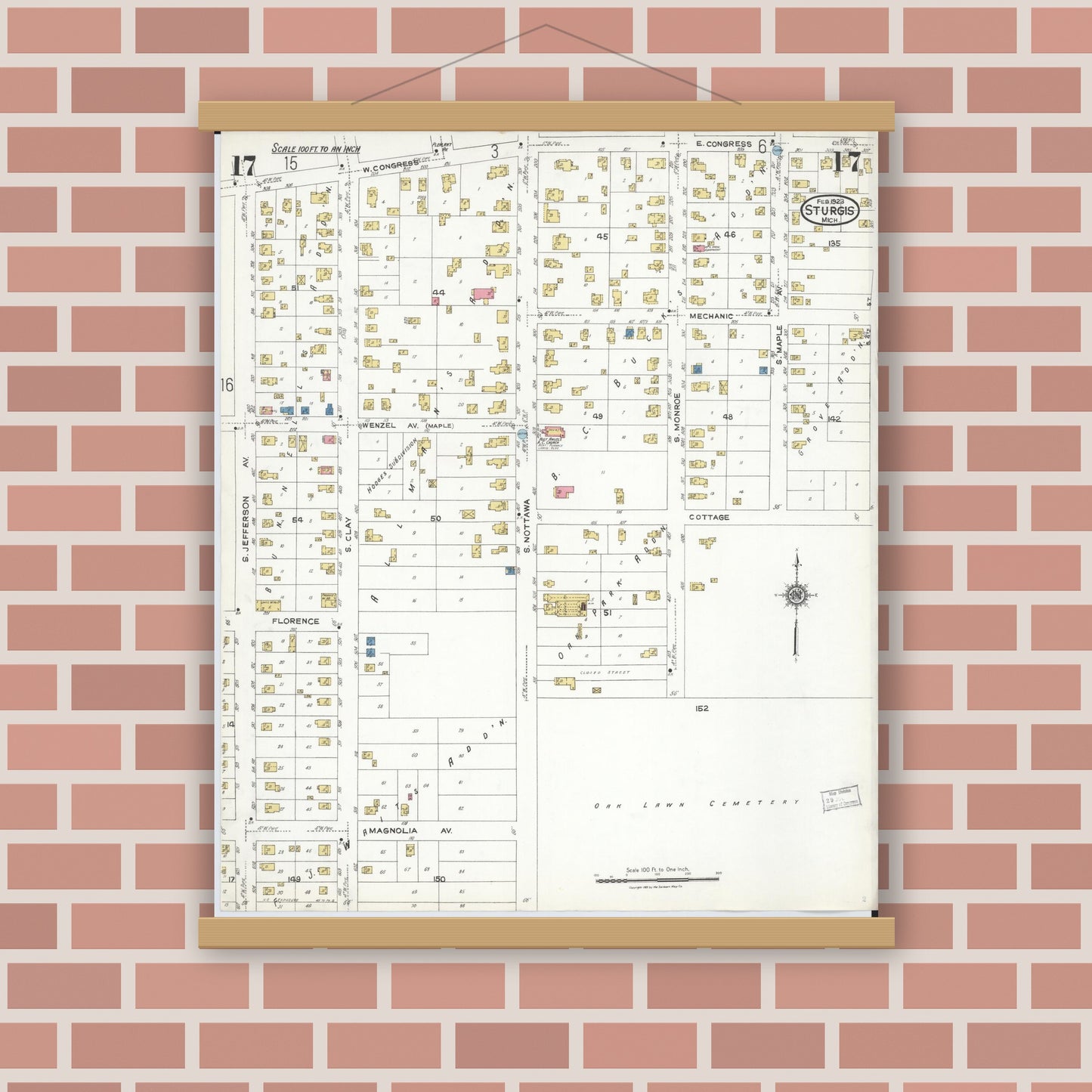 Old map wall art mockup — magnetic wood frame on brick wall — Sanborn Fire Insurance Map from Sturgis, Saint Joseph County, Michigan (1923), Sheet #0017