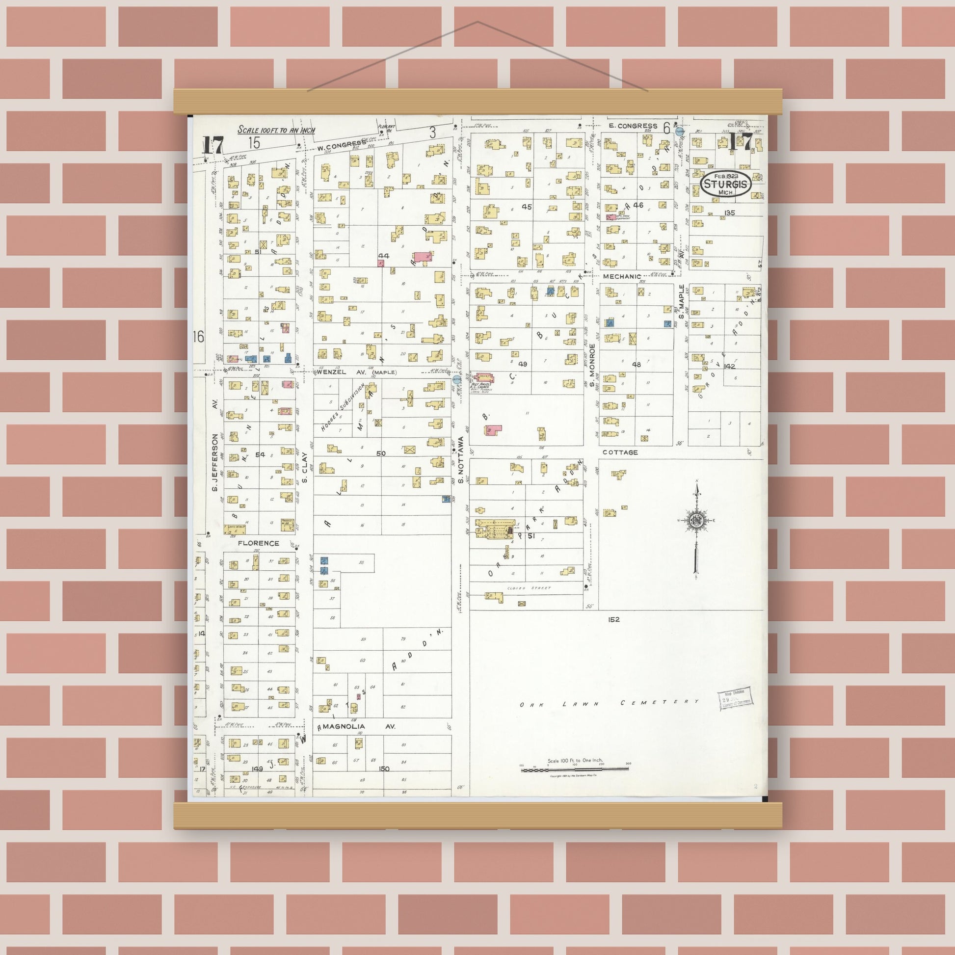 Old map wall art mockup — magnetic wood frame on brick wall — Sanborn Fire Insurance Map from Sturgis, Saint Joseph County, Michigan (1923), Sheet #0017