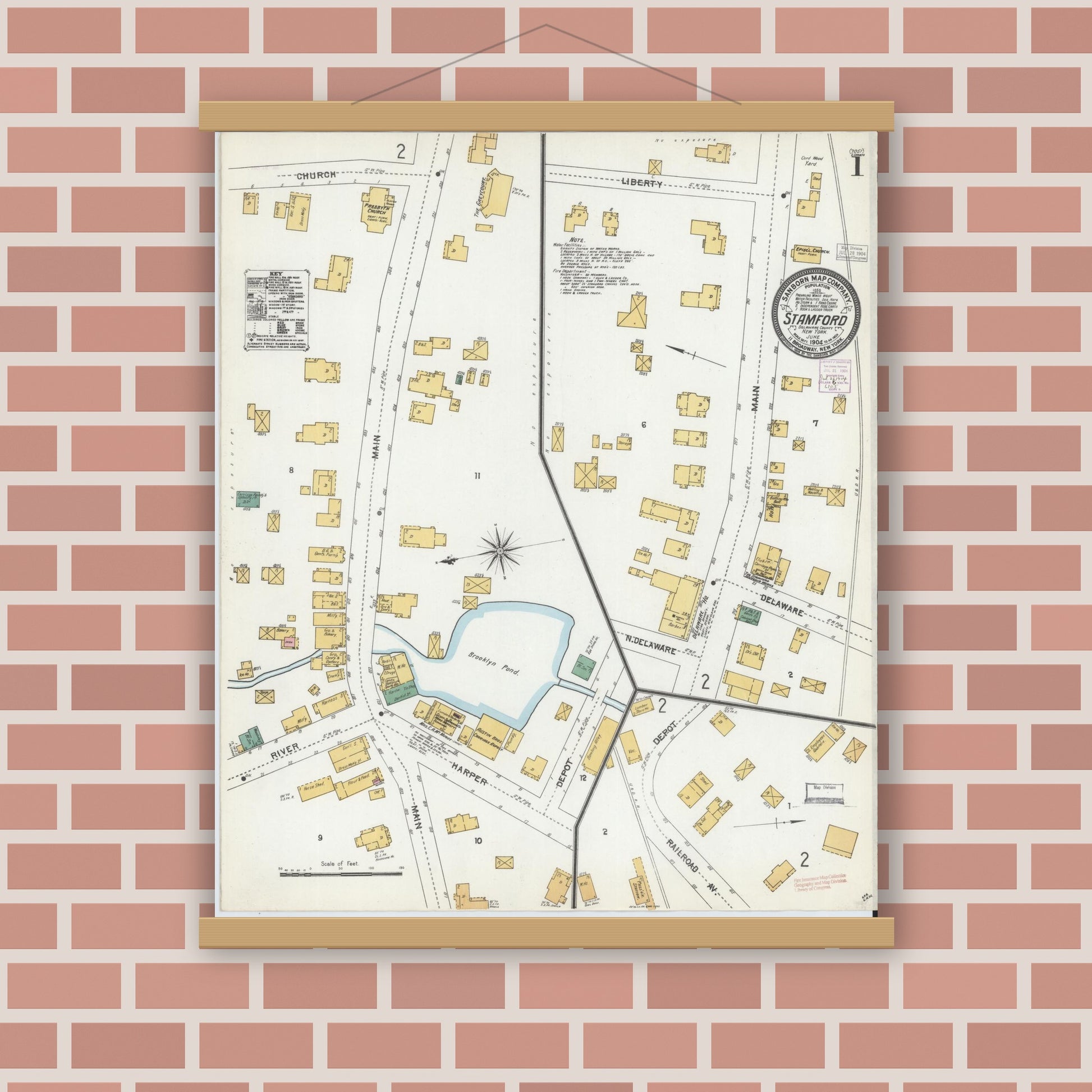 Old map wall art mockup — magnetic wood frame on brick wall — Sanborn Fire Insurance Map from Stamford, Delaware County, New York (1904), Sheet #0001