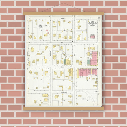 Old map wall art mockup — magnetic wood frame on brick wall — Sanborn Fire Insurance Map from Caldwell, Burleson County, Texas (1901), Sheet #0002
