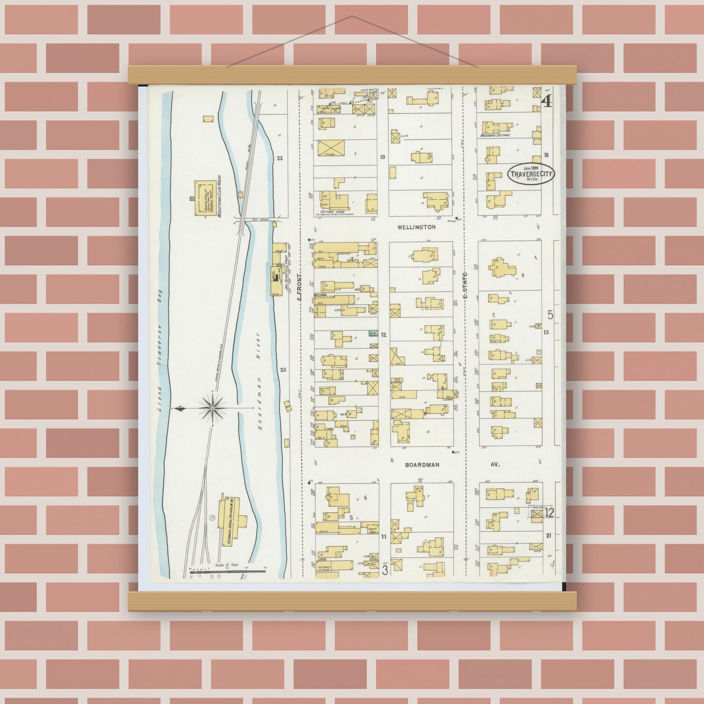 Old map wall art mockup — magnetic wood frame on brick wall — Sanborn Fire Insurance Map from Traverse City, Grand Traverse County, Michigan (1899), Sheet #0004