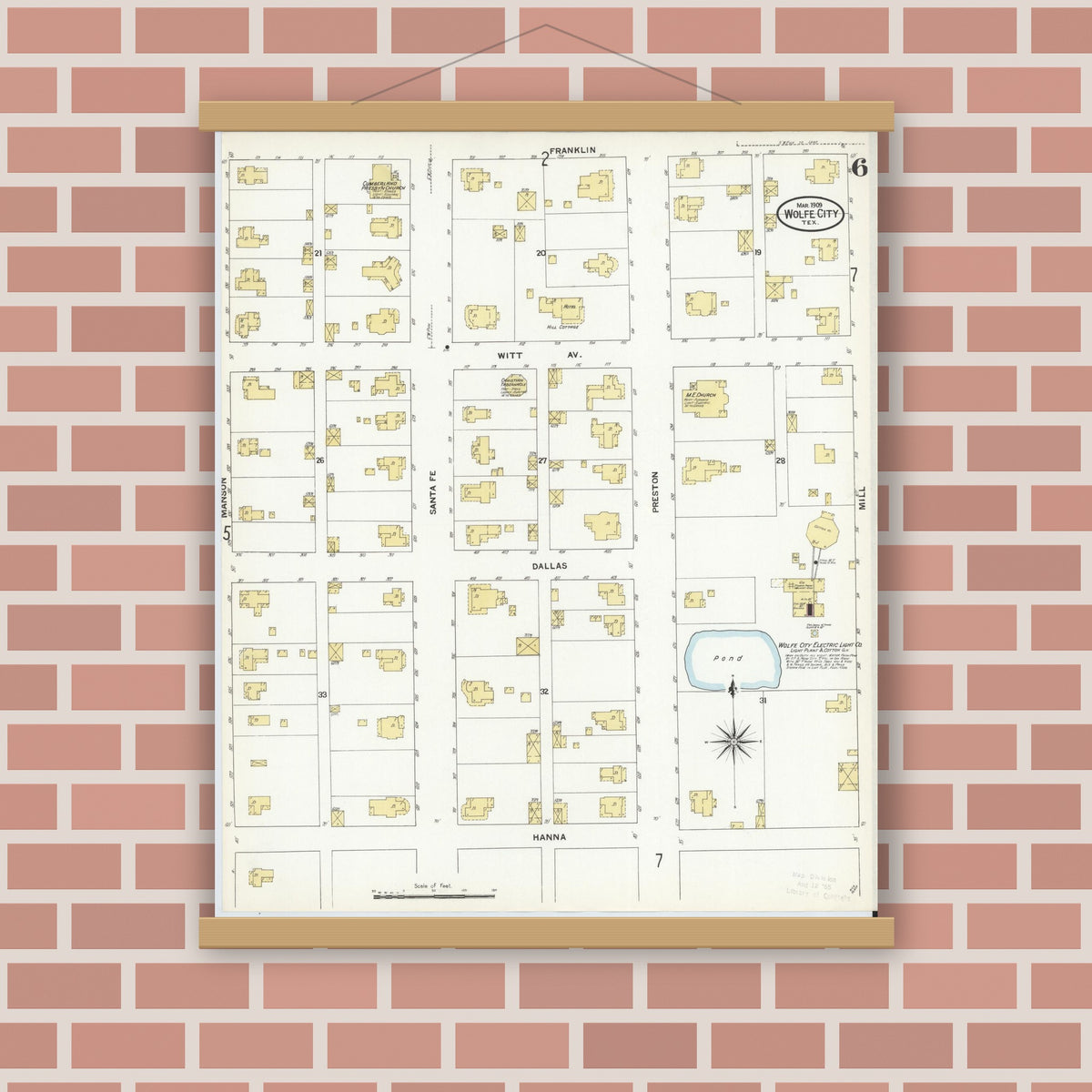 Old map wall art mockup — magnetic wood frame on brick wall — Sanborn Fire Insurance Map from Wolfe City, Hunt County, Texas (1909), Sheet #0006